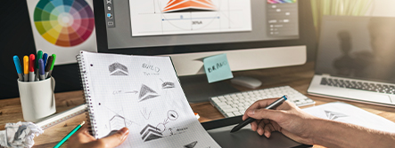 Graphic designer creating digital logos